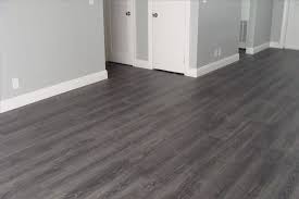 Basement Decor Uncover A Lot Of Stylish Finished Basement Remodelling Options That Will Help You Cre Grey Laminate Flooring Grey Hardwood Floors Grey Flooring