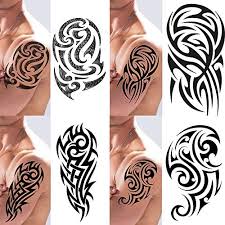 Spine tattoos are usually opted by women. Weekend Tattoos Stick On Black Temporary Tattoo Maori Tribal Body Art Sticker Transfer For Arms Shoulder Aztec Polynesian Samoan Hawaiian For Adult Men And Women 4 X All Tribal Tattoo Designs