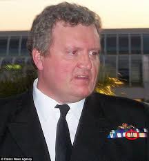 Bogus war hero who masqueraded as a distinguished Royal Navy Captain is  exposed after he put medal ribbon