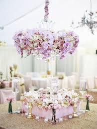 The bridal bouquet was a classic cascade style and included orchids, lilies, mini calla lilies and roses with greenery accents. Orchid Wedding Flowers Destination Wedding Blog Honeymoon Travel Trendy Bride