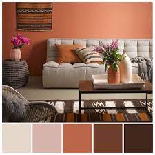 Add some sharp, contemporary styling in a mainly neutral living room with accents of black. Love These Earthy Hues Inspired By Resene Sunbaked A Rich Terracotta This Essential Color Palette Living Room Warm Living Room Colors Living Room Wall Color