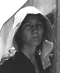 California, 1936... Caption Grandmother from Oklahoma proudly displays her  pieced quilt. California, Kern County... Source Farm Security  Administration Dorothea Lange photographer