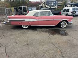 Image result for Carib Coral 1957 Pontiac