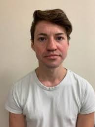 Daniel Dowdy smiles while pleading guilty to exposing himself to children