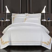 Crisp white or ivory linens are framed in tailored, double rows of satin stitching. 100 Cotton White Embroidered Hotel Bedding Set 4 6pcs King Queen Size Aty Home Decor