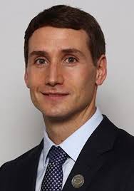 Friday Staff Feature Dr. Mike Schenkel Dr. Mike Schenkel is a passionate  and dedicated professional and is known for his warm personality and  excellent clinical care. Dr. Schenkel earned his Doctorate of