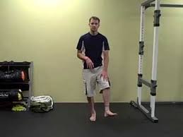 Squats Why You Need To Do Them And How To Do Them Right Nerd Fitness Nerd Fitness How To Squat Properly How To Do Squats