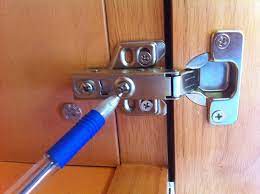 How To Adjust The Alignment Of Cabinet Doors Cabinet Doors Repair Home Repair