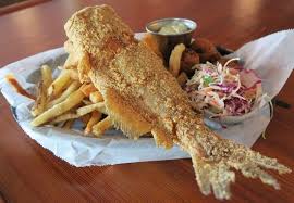 Grilled corn on the cob. The Whole Fried Catfish Served With The Usual Trimmings Slaw Fries And Hush Puppies High Catfish Recipes Fried Whole Catfish Recipe Fried Catfish Recipes