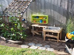 Gardening Area Mud Kitchen Trellis With Vice Growing On It To Eventually Create Shade Mud Kitchen For Kids Backyard For Kids Mud Kitchen