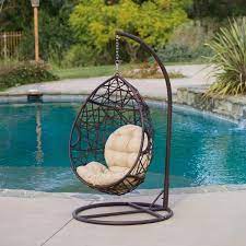 Swing life away with the. Outdoor Wicker Hanging Chair Shop Cayuse Outdoor Wicker Tear Drop Hanging Chair Christopher Hanging Chair Basket Chair Swinging Chair