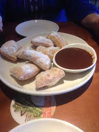 Soft, traditional italian doughnuts dusted with powdered sugar, served with chocolate sauce for dipping. Zeppoli Italian Doughnuts From Olive Garden With Chocolate Caramel Or Raspberry Sauce Zeppoli Recipe Recipes Olive Garden Desserts