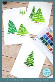 So i'm just mixing my two colors together right now. Pine Tree Painting A Watercolor Tutorial The Kitchen Table Classroom