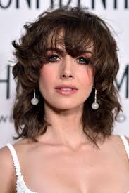 Whether you're choosing short choppy layers or sleek long layers, there are so many ways you can try a layered haircut. 40 Best Hairstyles With Bangs Photos Of Celebrity Haircuts With Bangs