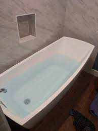 Hd00.10old bath tub full of water in allotment garden medium. I Just Installed A Nice White Slipper Tub But Now I Noticing That My Water Has A Blue Tint Is This Cause For Concern Plumbing