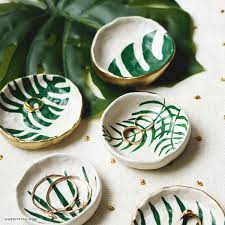 These little diy trinket trays / jewelry dishes are just upcycled plant saucers and planters! Make Diy Trinket Dishes With Tropical Leaves