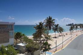 Luxurious beach accommodations with tasteful, modern furnishings, located inside a gated community with private parking. Mar Studio Unwind By The Ocean Apartments For Rent In San Juan Beach Apartment Ocean View Beach
