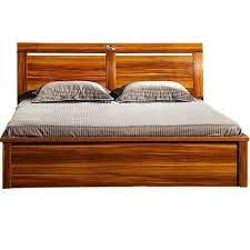 For a modern touch, try one in a dark hue that mixes materials, such as metal or upholstery, along with traditional wood. Brown Wooden Designer Bed Economic Design Concept Id 14652409791