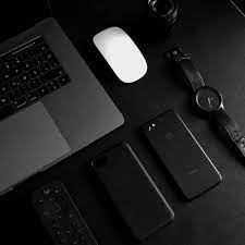 White ceramic mug near eyeglasses with black frames and gray laptop computer on brown table. Oled Wallpapers Free Hd Download 500 Hq Unsplash