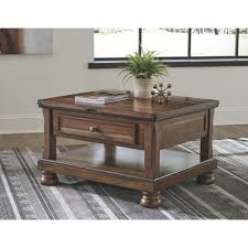 Not only does the top on this coffee table lift up, but there's also a convenient little drawer on the side for items you want to have easier access to. Charlton Home Sebago Lift Top Coffee Table With Storage Reviews Wayfair