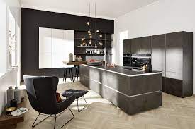 the portland in cement anthracite in combination with corona in high gloss arctic white fulfils our idee deco cuisine design de cuisine moderne couleur cuisine