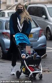 Emerald fennell was born emerald lilly fennell on october 1, 1985, in england under the constellation sign the duo is ready to welcome their baby, and they can get married at any time. The Crown S Emerald Fennell Wears A Navy Blue Coat As She Takes Her Child Out For A Stroll Broread Com