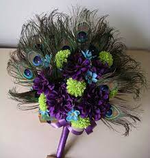 Peacocks are beautiful creatures, they have beautiful colors combination in their feathers. Peacock Feather Fan Bouquet Boutonniere By Bloomedtolastbridal Peacock Wedding Bouquet Feather Fan Boutonniere Wedding