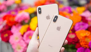 The back is glass, and there's a stainless steel band around the frame. Feature Iphone Xs And Xs Max Review Going For The Gold