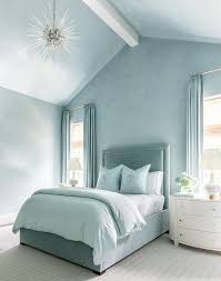 Part of uptown collection from rachael ray. Gray Velvet Headboard With Brass Nailhead Trim Transitional Bedroom