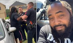 Texas police try to arrest a black father in his own front yard after  mistaking him for a criminal