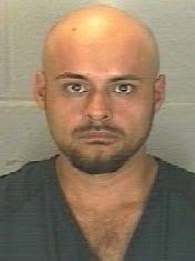 Felon charged with having handgun