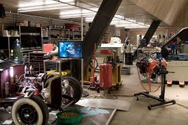 Taking Inspiration From Tony Stark S Workshop Upgrade Dragon Ultimate Man Cave Man Cave Garage Automatic Garage Door