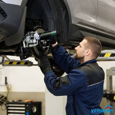 Mechanic working on brake disc