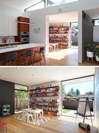 This New House Makes Use Of Outdoor Space To Extended The Living Areas Open Plan Kitchen Dining Open Plan Living Room House