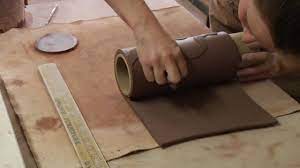 Grading in civil engineering and landscape architectural construction is the work of ensuring a level base, or one with a specified slope, for a construction work such as a foundation, the base course for a road or a railway, or landscape and garden improvements, or surface drainage. Clay Pottery Slab Building How To Form A Round Vase Youtube