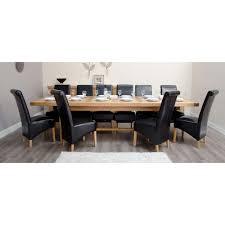 With an extra wide depth, this table seats eight with ample table space. Bordeaux Solid Oak Furniture Grand Dining Table And 12 Black Chairs Free Delivery