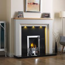 This precast corner fireplace is textured to look like the planks of redwood which cover the homes floors. Gb Mantels Ilford Oak Fireplace Oak Fireplaces Fire Surrounds Free Uk Delivery