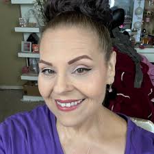 Who was the art teacher in Elmira NY who hosted parties for students at his  home