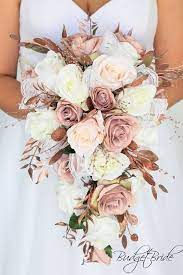 Blush pink rose gold wedding flowers. Rose Gold Wedding Flowers Dusty Rose Blush Pink Roses Cascading Tear Drop Rose Gold Wedding Flowers Gold Wedding Flowers Fall Wedding Bouquets