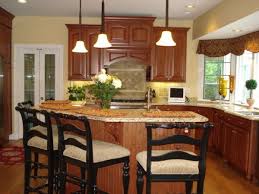 If you are considering adding a beautiful perhaps there is only room to attach two columns on either side of the bar, and this is fine too. I Want A Large Island Like This With Work Space And An Elevated Breakfast Bar The Lightin Kitchen Island Design Shallow Cabinets Kitchen Peninsula And Island