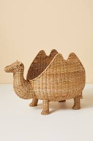 If the camel once gets his nose in the tent, his body will soon follow. Camel Storage Basket Rattan Wicker Woven Nursery Decor Toys Katie Considers