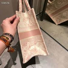 Introduced by maria grazia chiuri, creative director of christian dior, the dior book tote has become a staple of the dior aesthetic. Dior Women Small Dior Book Tote Pink Toile De Jouy Embroidery Lulux