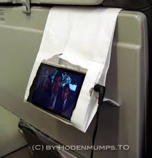 Vomit Bag Becomes Iphone Movie Watching Case Diy Phone Holder Cell Phone Holder Diy Diy Iphone Stand