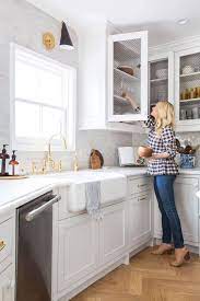 Instead of the traditional route of keeping plates and bowls in upper cabinets, emily took a different route and put them in drawers below the counters. Our Modern English Country Kitchen Emily Henderson