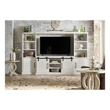 It's the perfect farmhouse decor idea for your living room, especially on those long walls behind the couch! Farmhouse White 4 Piece Entertainment Center Badcock Home Furniture More