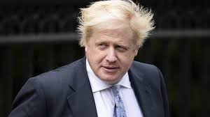 Adjectivo + substantivo ligados por hifen. Boris Johnson E O Novo Primeiro Ministro Britanico