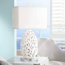 This coastal living inspired coral table lamp is designed with a stone cast white coral body mounted on a clear rectangular acrylic base. Kathy Ireland Ocean Treasures Coral White Table Lamp 9t580 Lamps Plus