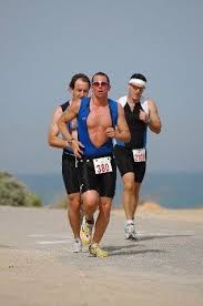 runners sink in the water