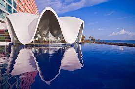 Perla restaurant, hovering above the resort's oceanside pool resembles an upturned concha sea shell. Hotel La Concha Renaissance San Juan Resort San Juan Trivago De