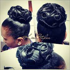 Fancy Sock Bun With Tiny Braids In A Brocade Inspired Pattern Black American Hair Fishtail Braid Hairstyles Cool Hairstyles